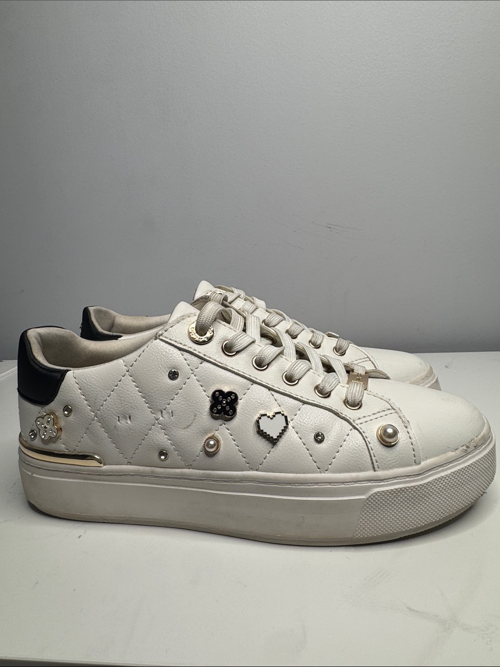 Aldo White Quilted Platform Sneakers with Black Heel and Gold Accents